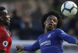 Chelsea's Willian controls the ball with ManU midfielder Paul Pogba, left, during their English Premier League soccer match between Chelsea and Manchester United at Stamford Bridge stadium in London Saturday, Oct. 20, 2018. (AP Photo/Matt Dunham)