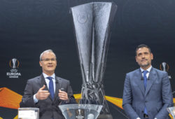 UEFA deputy secretary general Giorgio Marchetti, left, and former Spanish football player Andres Palop, right, ambassador for the UEFA Europa League, speak during the drawing of the games for the Europa League 2018/19 Round of 16, at the UEFA headquarters in Nyon, Switzerland, Friday, Feb. 22, 2019. (Martial Trezzini/Keystone via AP)