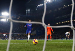 Soccer Football - Premier League - Chelsea v Tottenham Hotspur - Stamford Bridge, London, Britain - February 27, 2019  Tottenham's Kieran Trippier looks dejected as he scores an own goal and the second for Chelsea while Tottenham's Hugo Lloris looks dejected and Chelsea's Willian looks on  Action Images via Reuters/Paul Childs  EDITORIAL USE ONLY. No use with unauthorized audio, video, data, fixture lists, club/league logos or "live" services. Online in-match use limited to 75 images, no video emulation. No use in betting, games or single club/league/player publications.  Please contact your account representative for further details.