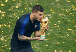 FILE PHOTO: Soccer Football - World Cup - Final - France v Croatia - Luzhniki Stadium, Moscow, Russia - July 15, 2018  France's Lucas Hernandez kisses the trophy as they celebrate winning the World Cup  REUTERS/Christian Hartmann/File Photo