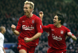 Liverpool's Sami Hyypia, left, celebrates scoring against Fulham with teammate Luis Garcia during their English Premiership League soccer match played at Anfield, Liverpool, England, Saturday Feb. 5, 2005. Liverpool won the match 3-1. (AP Photo/Paul Ellis) ** NO INTERNET/MOBILE USEAGE WITHOUT FAPL LICENCE - SEE IPTC SPECIAL INSTRUCTIONS FIELD FOR DETAILS **