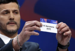 Former Brazilian soccer player Julio Cesar, ambassador for the UEFA Champions League, shows a ticket of Spain's club FC Barcelona, during the drawing of the matches for the Champions League 2018/19 quarter-finals at the UEFA headquarters in Nyon, Switzerland, Friday, March 15, 2019. (Salvatore Di Nolfi/Keystone via AP)