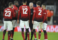 Manchester United players argue with referee Martin Atkinson during the English FA Cup Quarter Final soccer match between Wolverhampton Wanderers and Manchester United at the Molineux Stadium in Wolverhampton, England, Saturday, March 16, 2019. (AP Photo/Rui Vieira)