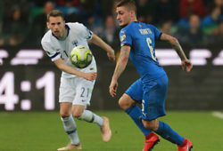 Italy's Marco Verratti, right, and Finland's Kasper Hamalainen vie for the ball during the Euro 2020 Group J qualifying soccer match between Italy and Finland at the Friuli-Dacia Arena stadium in Udine, Italy, Saturday, March 23, 2019. (Alberto Lancia/ANSA via AP)