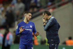 Chelsea's Eden Hazard, left, speaks with Chelsea manager Maurizio Sarri during the English League Cup final soccer match between Chelsea and Manchester City at Wembley stadium in London, England, Sunday, Feb. 24, 2019. (AP Photo/Tim Ireland)