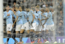 Manchester City players celebrate after Manchester City's Kevin De Bruyne scored his side's opening goal during the English Premier League soccer match between Manchester City and Cardiff City at Etihad stadium in Manchester, England, Wednesday, April 3, 2019. (AP Photo/Rui Vieira)