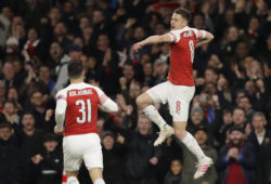 Arsenal's Aaron Ramsey, right, celebrates after scoring his side's first goal during the Europa League first leg quarterfinal soccer match between Arsenal and Napoli at Emirates stadium in London, Thursday, April 11, 2019. (AP Photo/Kirsty Wigglesworth)