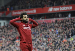 Liverpool's Mohamed Salah celebrates after scoring his side's second goal during the English Premier League soccer match between Liverpool and Chelsea at Anfield stadium in Liverpool, England, Sunday, April 14, 2019. (AP Photo/Rui Vieira)