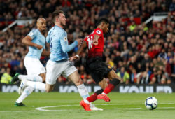 Soccer Football - Premier League - Manchester United v Manchester City - Old Trafford, Manchester, Britain - April 24, 2019  Manchester United's Marcus Rashford in action with Manchester City's Aymeric Laporte         Action Images via Reuters/Carl Recine  EDITORIAL USE ONLY. No use with unauthorized audio, video, data, fixture lists, club/league logos or "live" services. Online in-match use limited to 75 images, no video emulation. No use in betting, games or single club/league/player publications.  Please contact your account representative for further details.