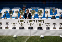 FILE PHOTO: Departing Real Madrid captain and goalkeeper Iker Casillas poses surrounded by trophies at an official send-off at the Bernabeu stadium in Madrid, Spain, July 13, 2015. Several hundred Real Madrid fans chanted for president Florentino Perez to resign at an official send-off for goalkeeper and captain Iker Casillas at the Bernabeu stadium on Monday.  Real held the presentation following criticism over the surreal nature of Casillas's tearful news conference on Sunday, when he appeared to be alone in the stadium press room to read out a farewell statement.   REUTERS/Andrea Comas/File Photo X90037