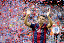 FILE PHOTO: Barcelona's Xavi Hernandez waves to supporters after their Spanish first division soccer match against Deportivo de la Coruna at Camp Nou stadium in Barcelona, Spain, May 23, 2015. REUTERS/Gustau Nacarino/File Photo X00435