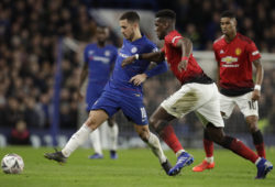 Chelsea's Eden Hazard, left, fights for the ball with Manchester United's Paul Pogba during the English FA Cup fifth round soccer match between Chelsea and Manchester United at Stamford Bridge stadium in London, Monday, Feb. 18, 2019. (AP Photo/Matt Dunham)