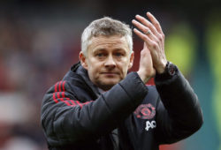 Manchester United manager Ole Gunnar Solskjaer applauds the fans after their English Premier League soccer match against Chelsea at Old Trafford, Manchester, England, Sunday, April 28, 2019. The game ended in a 1-1 draw. (Martin Rickett/PA via AP)