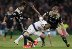 Tottenham's Lucas Moura, center, duels for the ball with Ajax's Nicolas Tagliafico, left, and Ajax's Frenkie de Jong during the Champions League semifinal first leg soccer match between Tottenham Hotspur and Ajax at the Tottenham Hotspur stadium in London, Tuesday, April 30, 2019. (AP Photo/Kirsty Wigglesworth)