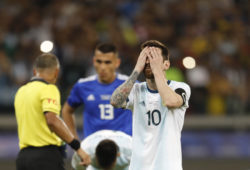 Argentina's Lionel Messi touches his face before scoring from a penalty spot against Paraguay during a Copa America Group B soccer match at the Mineirao stadium in Belo Horizonte, Brazil, Wednesday, June 19, 2019. (AP Photo/Natacha Pisarenko)