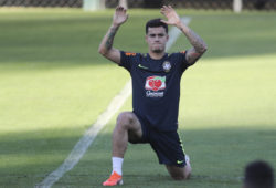 Philippe Coutinho stretches during a training session of Brazil national soccer team in Belo Horizonte, Brazil, Monday, July 1, 2019. Brazil will face Argentina for a Copa America semifinal match on July, 2.(AP Photo/Natacha Pisarenko)