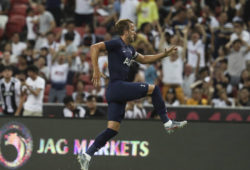 Tottenham's Harry Kane celebrates after scoring a goal during the International Champions Cup soccer match between Juventus and Tottenham Hotspur in Singapore, Sunday, July 21, 2019. (AP Photo/Danial Hakim)