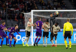 July 13, 2019 - Perth, WA, USA - PERTH, AUSTRALIA - JULY 13: Manchester United goalkeeper Joel Pereira (40) catches the ball from a corner above team mates Manchester United defender Chris Smalling (12) and Manchester United defender Aaron Wan-Bissaka (29) during the International soccer match between Manchester United and Perth Glory on July 13, 2019 at Optus Stadium in Perth, Australia. (Photo by Speed Media/Icon Sportswire.