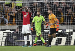 Manchester United's Paul Pogba reacts after his penalty was saved by Wolverhampton Wanderers goalkeeper Rui Patricio during the English Premier League soccer match between Wolverhampton Wanderers and Manchester United at the Molineux Stadium in Wolverhampton, England, Monday, Aug. 19, 2019. (Nick Potts/PA via AP)