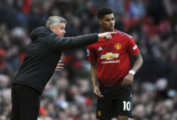 Manchester United manager Ole Gunnar Solskjaer talks to Manchester United's Marcus Rashford during the English Premier League soccer match between Manchester United and West Ham United at Old Trafford in Manchester, England, Saturday, April 13, 2019. (AP Photo/Rui Vieira)