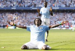 FILE - In this Saturday, Sept. 12, 2009 file photo Manchester City's Emmanuel Adebayor celebrates in front of Arsenal supporters after scoring against his former club during the English Premier League soccer match at The City of Manchester Stadium, Manchester, England. Manchester City striker Emmanuel Adebayor was charged with violent and improper conduct by the Football Association on Tuesday Sept. 15, 2009 for his alleged stamp on Robin van Persie and for his goal celebration in Saturday's 4-2 victory over Arsenal. (AP Photo/Jon Super, File) ** NO INTERNET/MOBILE USAGE WITHOUT FOOTBALL ASSOCIATION PREMIER LEAGUE (FAPL) LICENCE. CALL +44 (0) 20 7864 9121 or EMAIL info@football-dataco.com FOR DETAILS **