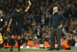 Manchester City's head coach Pep Guardiola is shown yellow card during the group C Champions League soccer match between Manchester City and Dinamo Zagreb at the City of Manchester Stadium in Manchester, England, Tuesday, Oct. 1, 2019. (AP Photo/Dave Thompson)  XDB127