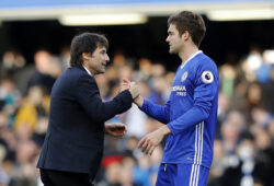 Chelsea's manager Antonio Conte, left shakes hands with his player Chelsea's Marcos Alonso after the end of the English Premier League soccer match between Chelsea and Arsenal at Stamford Bridge stadium in London, Saturday, Feb. 4, 2017. Chelsea won the match 3-1. (AP Photo/Frank Augstein)