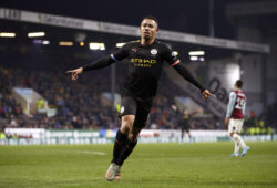 Manchester City's Gabriel Jesus, right, celebrates scoring his sides first goal of the game against Burnley, during their Premier League soccer match at Turf Moor in Burnley, England, Tuesday Dec. 3, 2019. (Martin Rickett/PA via AP)  LRC839