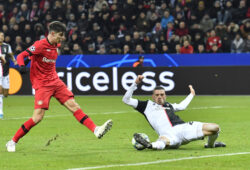 Juventus' Merih Demiral, right, dives to save a ball by Leverkusen's Kai Havertz during the Champions League Group D soccer match between Bayer Leverkusen and Juventus at the BayArena in Leverkusen, Germany, Wednesday, Dec. 11, 2019. (AP Photo/Martin Meissner)  HAS127
