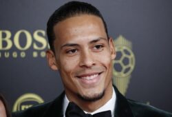 Liverpool's Virgil van Dijk poses during the Golden Ball award ceremony at the Grand Palais in Paris, Monday, Dec. 2, 2019. Awarded every year by France Football magazine since Stanley Matthews won it in 1956, the Ballon d'Or, Golden Ball for the best player of the year will be given to both a woman and a man. (AP Photo/Francois Mori)  XTS116