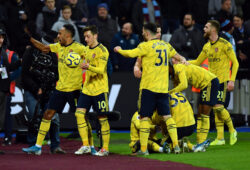 Football - 2019 / 2020 Premier League - West Ham United vs. Arsenal Arsenal s Nicolas Pepe seated celebrates with team mates after scoring his side s second goal, at The London Stadium. COLORSPORT/ASHLEY WESTERN PUBLICATIONxNOTxINxUK