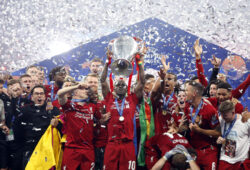 June 1, 2019 - Madrid, Spain - Liverpool team recieves the trophy as they celebrate the victory after the Final Round of the UEFA Champions League match between Tottenham Hotspur FC and Liverpool FC at Wanda Metropolitano Stadium in Madrid..Final Score: Tottenham Hotspur FC 0 - 2 Liverpool FC.