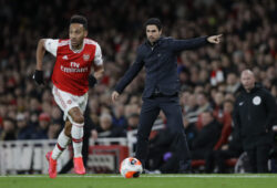 Arsenal's head coach Mikel Arteta, right, gives instructions from the side line as Arsenal's Pierre-Emerick Aubameyang runs with the ball during the English Premier League soccer match between Arsenal and Everton at Emirates stadium in London, Sunday, Feb. 23, 2020. (AP Photo/Kirsty Wigglesworth)  HAS145