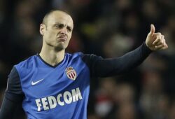 Monaco's Dimitar Berbatov gestures after scoring his side's second goal during the Champions League round of 16 soccer match between Arsenal and AS Monaco at the Emirates Stadium in London, Wednesday, Feb. 25, 2015.  (AP Photo/Matt Dunham)