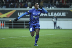 Gent's Jonathan David, right, celebrates after scoring the opening goal during an Europa League round 32 second leg soccer match between Gent and Roma at the KAA Gent stadium in Gent, Belgium, Thursday, Feb. 27, 2020. (AP Photo/Francisco Seco)  FS108