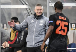 Manchester United's manager Ole Gunnar Solskjaer smiles to changed out Odion Ighalo during the Europa League round of 16 first leg soccer match between Linzer ASK and Manchester United in Linz, Austria, Thursday, March 12, 2020. The match is being played in an empty stadium because of the coronavirus outbreak. (AP Photo/Kerstin Joensson)  mme138