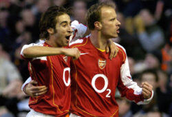 Arsenal's Dennis Bergkamp celebrates with team-mate Mathieu Flamini, left, after scoring against Newcastle United during their English Premier League soccer match at Highbury Stadium, London, Sunday Jan. 23, 2005. (AP Photo/ Rebecca Naden, PA) ** UNITED KINGDOM OUT MAGS OUT NO SALES ONLINE OUT INTERNET OUT **