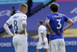 Chelsea's Ross Barkley, left, speaks with Leicester's Ben Chilwell during the FA Cup sixth round soccer match between Leicester City and Chelsea at the King Power Stadium in Leicester, England, Sunday, June 28, 2020. (Tim Keeton/Pool via AP)  XDMV187