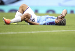 Manchester City's Sergio Aguero reacts as he lies on the pitch injured during the English Premier League soccer match between Manchester City and Burnley at Etihad Stadium, in Manchester, England, Monday, June 22, 2020. (AP Photo/Martin Rickett,Pool)  XMB162