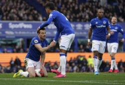 Everton's Mason Holgate congratulates teammate Leighton Baines, left, after he prevented a goal during the English Premier League soccer match between Everton and Manchester United at Goodison Park in Liverpool, England, Sunday, March 1, 2020. (AP Photo/Jon Super)  XAF136