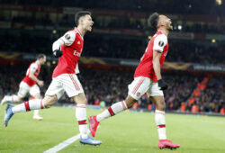 Arsenal's Pierre-Emerick Aubameyang, right, celebrates after scoring his side's first goal during the Europa League round of 32, second leg, soccer match between Arsenal and Olympiakos at Emirates stadium in London, England, Thursday, Feb. 27, 2020 . (AP Photo/Frank Augstein)  FAS127