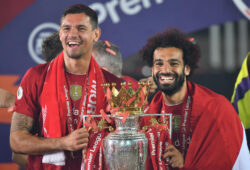 epa08562326 Liverpool's Dejan Lovren (L) and Mohamed Salah celebrate the Premier League title following the English Premier League soccer match between Liverpool FC and Chelsea FC in Liverpool, Britain, 22 July 2020.  EPA-EFE/Paul Ellis/NMC/Pool EDITORIAL USE ONLY. No use with unauthorized audio, video, data, fixture lists, club/league logos or 'live' services. Online in-match use limited to 120 images, no video emulation. No use in betting, games or single club/league/player publications.
