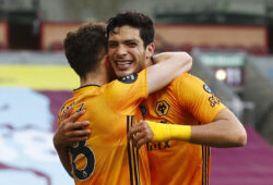 Soccer Football - Premier League - Burnley v Wolverhampton Wanderers - Turf Moor, Burnley, Britain - July 15, 2020  Wolverhampton Wanderers' Raul Jimenez celebrates scoring their first goal with Diogo Jota, as play resumes behind closed doors following the outbreak of the coronavirus disease (COVID-19)  REUTERS / Jason Cairnduff / Pool  EDITORIAL USE ONLY. No use with unauthorized audio, video, data, fixture lists, club/league logos or "live" services. Online in-match use limited to 75 images, no video emulation. No use in betting, games or single club/league/player publications.  Please contact your account representative for further details.  X03805
