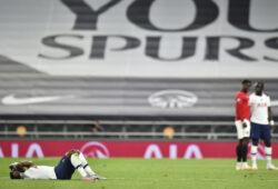 Tottenham's Serge Aurier reacts as he lays on the field at the completion of the English Premier League soccer match between Tottenham Hotspur and Manchester United at Tottenham Hotspur Stadium in London, England, Friday, June 19, 2020. (AP Photo/Glyn Kirk, Pool)  XMB152