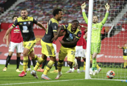 Southampton's Michael Obafemi, 20, celebrates after scoring his team's second goal during the English Premier League soccer match between Manchester United and Southampton at Old Trafford in Manchester, England, Monday, July 13, 2020. (AP Photo/Dave Thompson,Pool)  XMB178