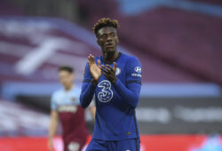 Chelsea's Tammy Abraham, claps his teammates as they wait for the start of theEnglish Premier League soccer match between West Ham United and Chelsea at the London Stadium stadium in London, Wednesday July 1, 2020. (Michael Regan/Pool via AP)  XAG117