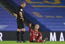 Soccer Football - Premier League - Brighton & Hove Albion v Liverpool - The American Express Community Stadium, Brighton, Britain - July 8, 2020  Liverpool's Jordan Henderson speaks with referee Craig Pawson, as play resumes behind closed doors following the outbreak of the coronavirus disease (COVID-19)  Daniel Leal Olivas/Pool via REUTERS  EDITORIAL USE ONLY. No use with unauthorized audio, video, data, fixture lists, club/league logos or "live" services. Online in-match use limited to 75 images, no video emulation. No use in betting, games or single club/league/player publications.  Please contact your account representative for further details.  X01348