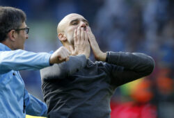 Manchester City coach Pep Guardiola, right, celebrates at the end of the English Premier League soccer match between Brighton and Manchester City at the AMEX Stadium in Brighton, England, Sunday, May 12, 2019. Manchester City defeated Brighton 4-1 to win the championship. (AP Photo/Frank Augstein)