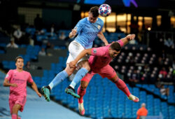 epa08590683 Manchester City's Aymeric Laporte (C) in action against Real Madrid's Luka Jovic (R) during the UEFA Champions League Round of 16 second leg soccer match between Manchester City and Real Madrid in Manchester, Britain, 07 August 2020.  EPA-EFE/Dave Thompson / POOL