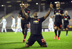 epa08290283 Manchester United's Odion Ighalo (C) celebrates after scoring the 1-0 lead during the UEFA Europa League round of 16, first leg soccer match between LASK Linz and Manchester United in Linz, Austria, 12 March 2020.  EPA-EFE/CHRISTIAN BRUNA